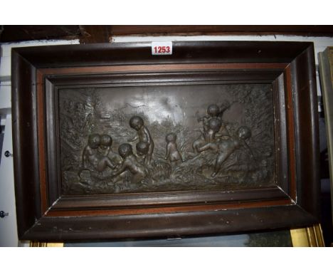 A bronzed electrotype panel of putti, 17 x 35cm.&nbsp; 