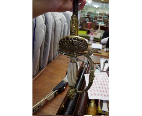 An early 20th century Dutch Court Sword,&nbsp;with mother of pearl grips and 80cm acid-etched triangular blade, (no scabbard)