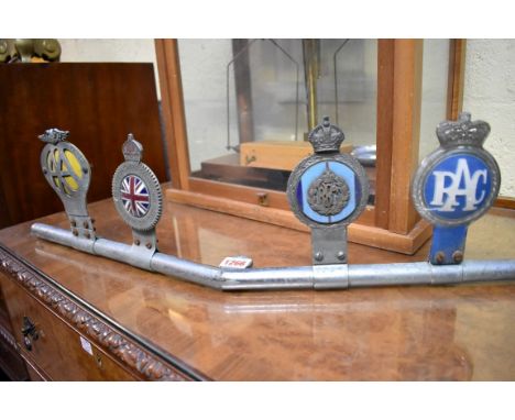 Automobilia:&nbsp;four vintage car radiator badges, to include: an RFC chrome and enamel example, mounted on bracket. 