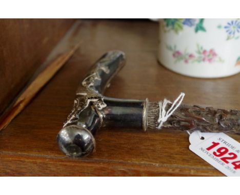 A Chinese carved hardwood and silver mounted walking stick,&nbsp;by Wang Hing. 