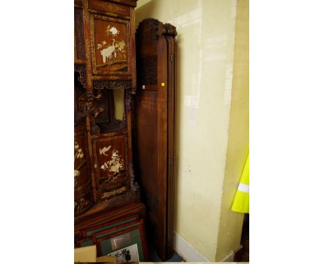 An Eastern carved and pierced hardwood four fold screen,&nbsp;each panel 182cm high x 51cm wide.&nbsp; 