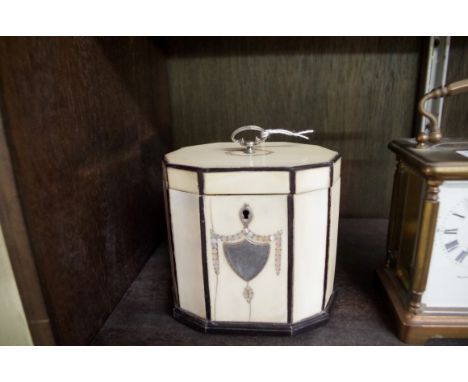 A George III ivory, ebony and shell tea caddy,&nbsp;11cm wide.&nbsp; 