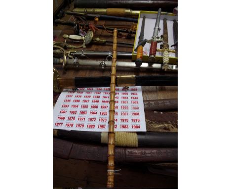 An antique bamboo swagger swordstick,&nbsp;60cm long. 