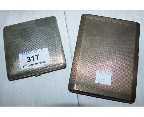 A silver powder compact; a silver cigarette case, 8½ oz.
