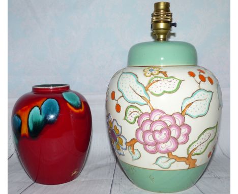 A 1970's Poole ovoid vase with red ground; a 1930's Crown Devon tube lined table lamp