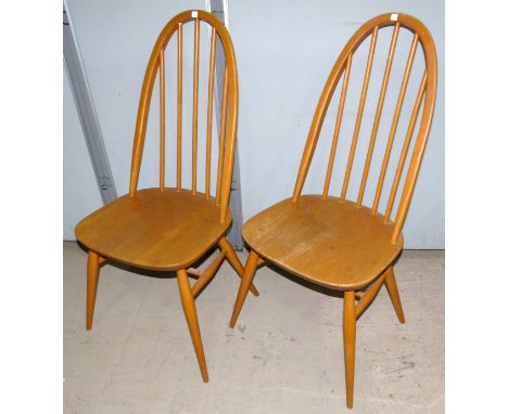 A set of 4 Ercol light elm dining chairs with hoop backs