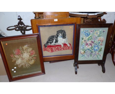 A firescreen with 19th century woolwork picture of a dog; 2 other similar items