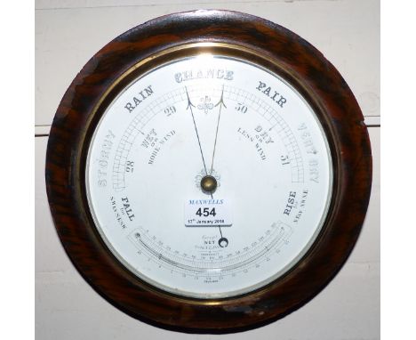 A 19th century aneroid barometer with thermometer, 8" dial