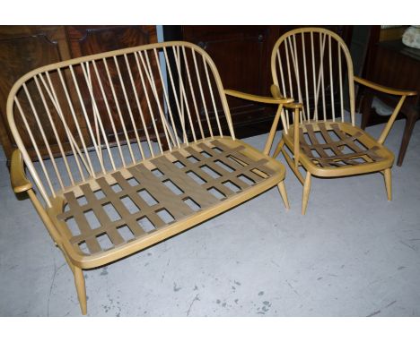 An Ercol light elm 2 seater settee and similar armchair with stick backs