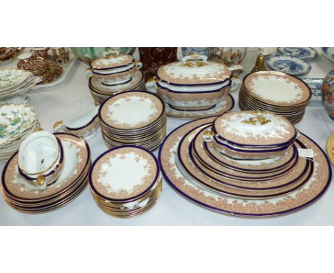 A 19th century Worcester stoneware dinner service to include large tureen with ladle, oval tree meat dish, 22", 6 graduating 