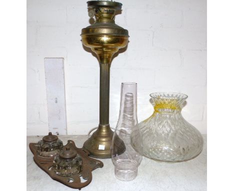 A Victorian cast iron 2 bottle inkstand; a klaxon horn; a Victorian oil lamp; a pair of 19th century brass candlesticks