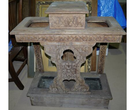 A 19th century carved oak stick stand