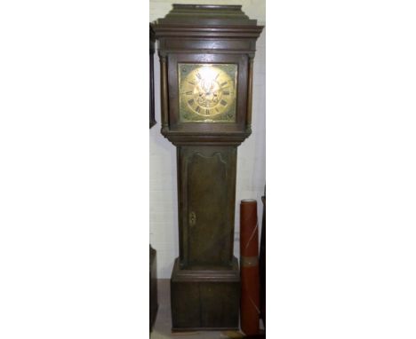 An 18th century oak longcase clock by Jno Clayton, Marple, with caddy top hood, turned side columns, full length door, square