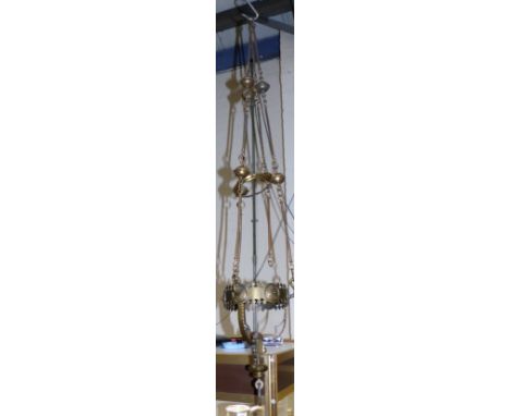 A Victorian Gothic Revival brass pendant sanctuary lamp, drop 76"