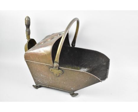 A Late 19th Century Copper Helmet Shaped Coal Scuttle with Brass Loop Handle and Wooden Handled Shovel, 41cms Long