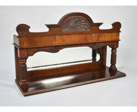 A Late Victorian/Edwardian Wall Hanging Mirrored Mahogany Shelf with Cast Decoration and Reeded Supports, 79cms Wide and 48cm
