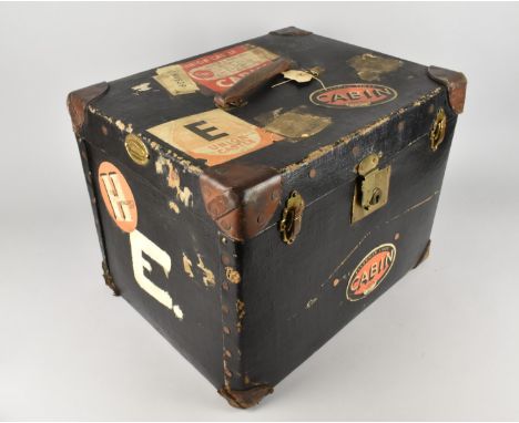 A Vintage Leather Mounted Canvas Covered Cabin Trunk with Various Paper Labels, 45cms Wide and 35cms High