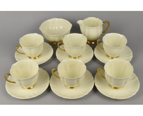 A Royal Doulton Cream and Gilt Trim Tea Set for Six to Comprise Cups, Saucers, Milk Jug and Sugar Bowl, Pattern No. V2336
