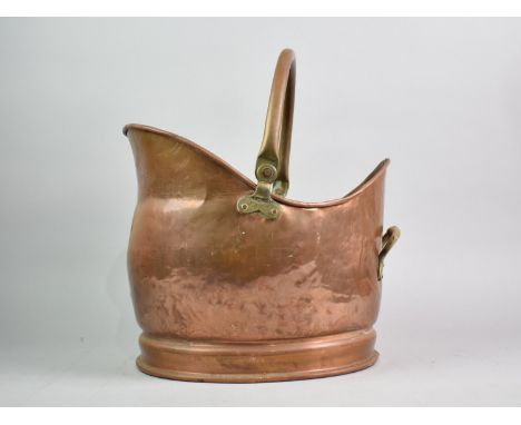 A Mid/Late 20th Century Copper and Brass Helmet Shaped Coal Scuttle