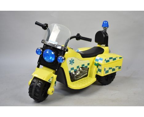 A Childs Ride On Ambulance Scooter, Untested and No Charger