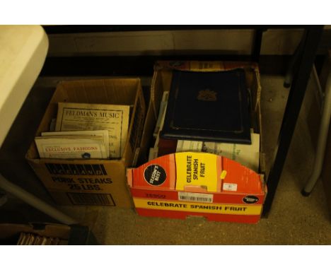 Two boxes containing various ephemera, post-cards and sheet music