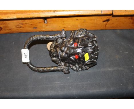 A cast iron door knocker 