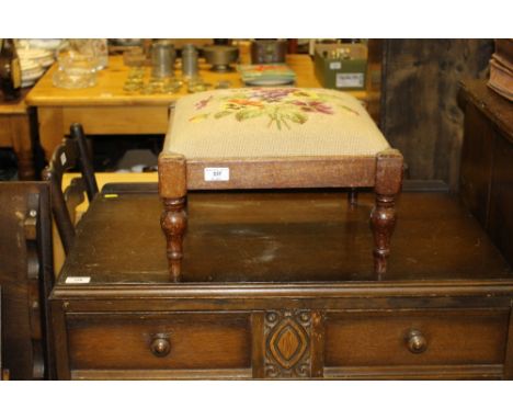 A mahogany footstool with tapestry upholstered seat 