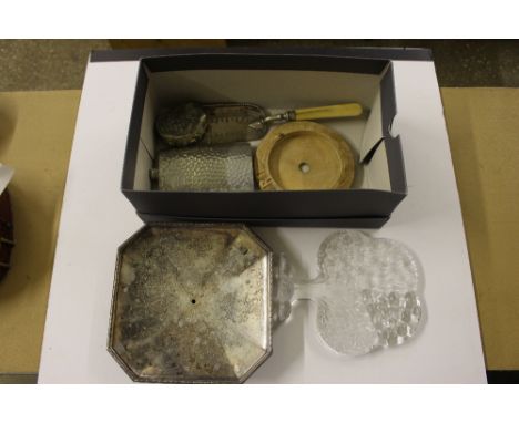 A box containing glass paperweight, wooden butter dish, hip flask and other metalware 