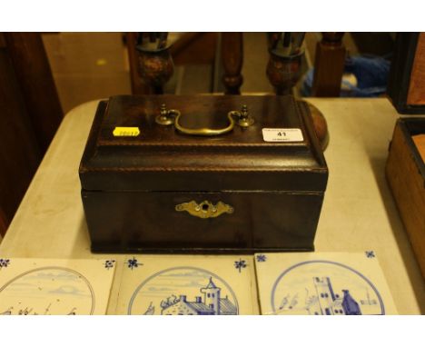 A Georgian mahogany tea caddy