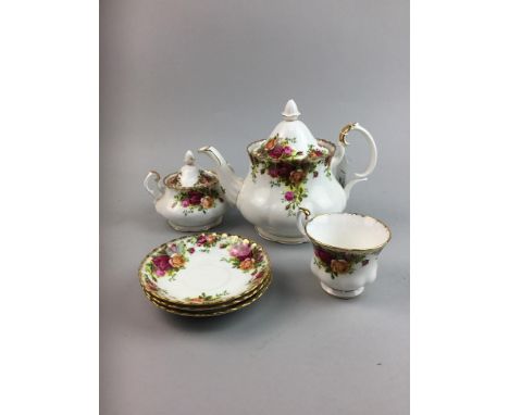 ROYAL ALBERT OLD COUNTRY ROSES TEA SERVICE, comprising tea pot, cream, sugar, six trios and sandwich plate