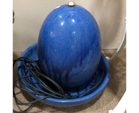 ELECTRIC FOUNTAIN, in basin, blue in colour, approximately 43cm high