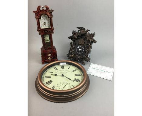 LOT OF THREE CLOCKS, including a Westminster Clock Co. wall clock and an Edelweiss cuckoo clock