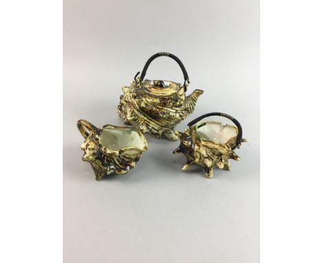 SEASHELL MOTIF TEA SERVICE, comprising tea pot, cream and sugar, along with a collection of small crystal and hardstone figur