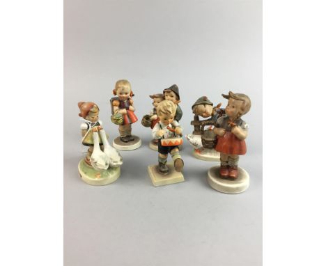 LOT OF SIX SMALL HUMMEL FIGURES, including two figures of children modelled with geese and a boy playing the drums