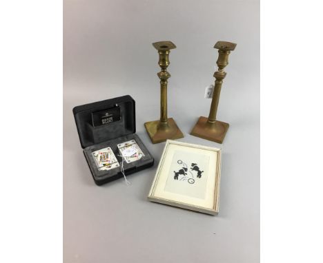 PAIR OF BRASS CANDLESTICKS, 30cm high, along with a table mirror, picnic set, set of playing cards and framed embroidery of d