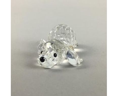 SWAROVSKI FIGURE OF A DOG, in original box, along with nest of swans and a collection of ceramic animals including bunnies an