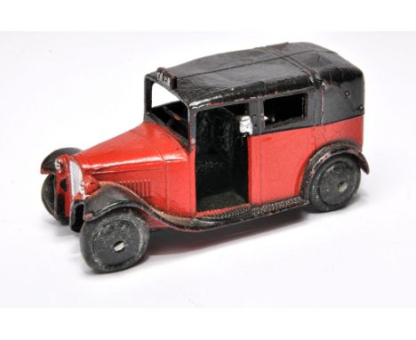 Dinky no. 36g pre-war Taxi. Issue is red and black. Displays good with some signs of fatigue but retains good structural inte