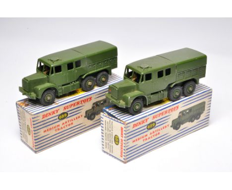 Dinky duo of no. 689 Medium Artillery Tractor. Display good to very good in fair and good boxes.