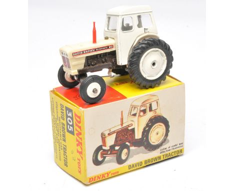 Dinky no. 305 David Brown Tractor. Displays good to very good, some fading to plastic, in very good box.