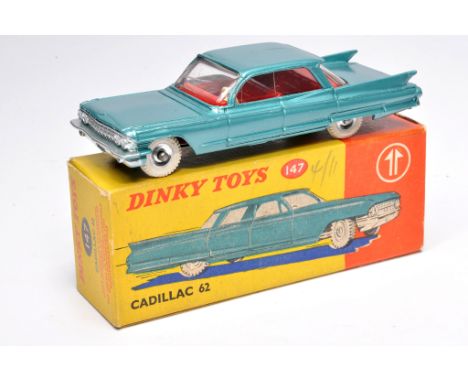 Dinky no. 147 Cadillac 62. Metallic green with red interior. Displays mostly excellent with little sign of wear. In excellent