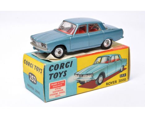 Corgi No. 252 Rover 2000. Blue with red interior. Chrome hubs. Displays very good, some minor age related marks. In excellent