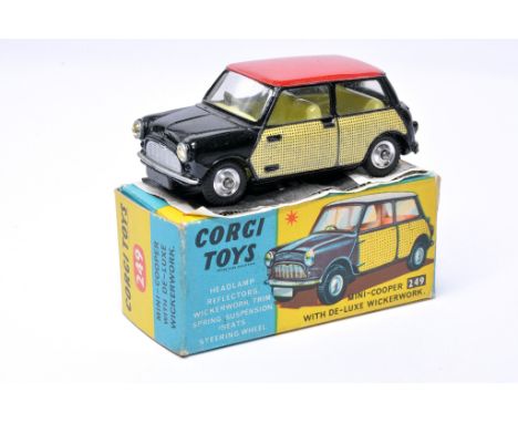 Corgi No.  249 Mini Cooper with deluxe wickerwork. Black, red (wickerwork decal) with lemon interior, plus chrome hubs. Displ