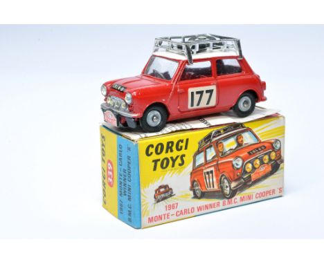 Corgi No. 339 BMC Mini Cooper S Monte Carlo. Red / White with red interior, RN177, plus chrome hubs. Displays generally excel