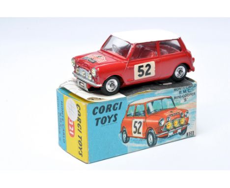 Corgi No. 321 BMC Mini Cooper S Monte Carlo. Red / White with red interior, RN52, plus chrome hubs. Displays generally excell