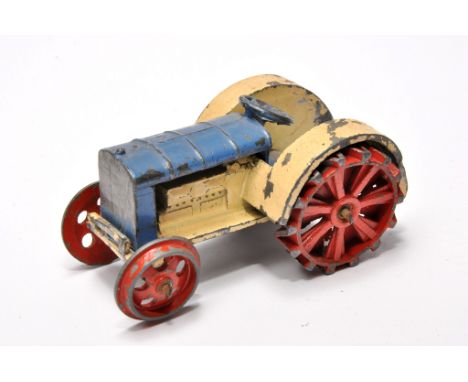 Dinky no. 22e pre-war Farm Tractor. Issue is blue and cream with red wheels. Displays fair with some notable signs of wear an