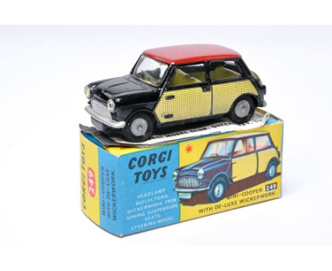 Corgi No.  249 Mini Cooper with deluxe wickerwork. Black, red (wickerwork decal) with lemon interior, plus cast hubs. Display