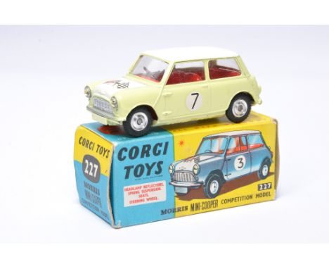 Corgi No. 227 Morris Mini Cooper Competition Model. Yellow with red interior, RN7, flag decal, plus chrome hubs. Displays gen