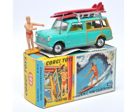 Corgi No. 485 Surfing with the BMC Mini Countryman. Turquoise blue with lemon interior and chrome spun hubs. Complete with th