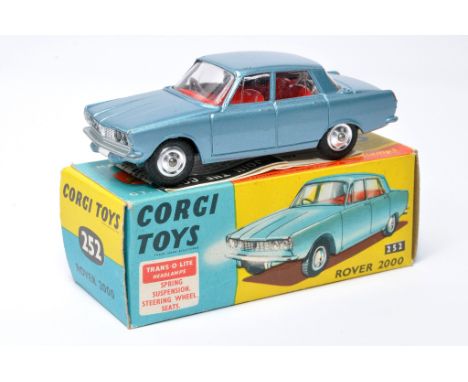 Corgi No. 252 Rover 2000. Blue with red interior. Chrome hubs. Displays good to very good, some more notable marks. In excell
