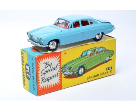 Corgi No. 238 Jaguar Mark X. Light blue with red interior, chrome hubs (inc luggage). Displays very good with the odd minor c